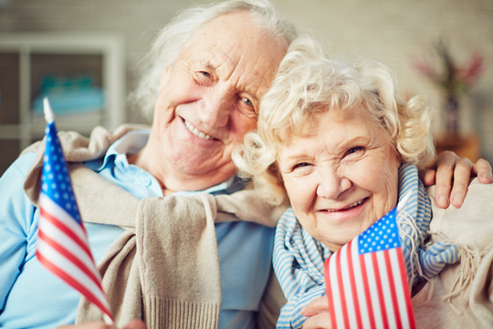 two elderly man and woman looking for investment